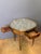 A late 19th-century Directoire bouillotte table in cherry wood. It features two drawers and rests on four turned legs...