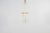 Beautiful four-light pendant lamp with golden brass structure and supports and cylindrical glass diffusers with irregular...