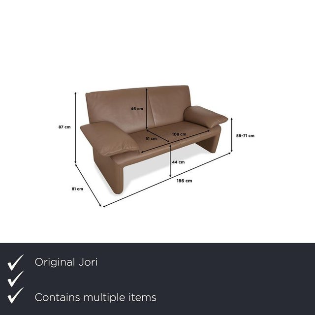 The Jori set consists of two JR 8750 two-seater sofas upholstered in brown genuine leather. It features a minimalist, airy...