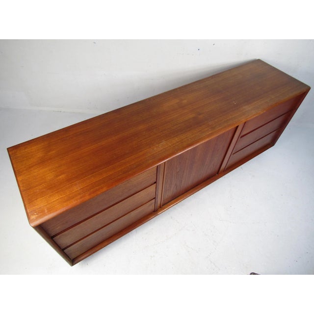 Stylish Danish Mid-Century Modern dresser by Art Furn. Good-looking teak veneer throughout, with six dovetail-jointed...