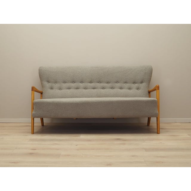 The sofa was made in 1964, designed by Soren Hansen for the well-known Danish manufactory Fritz Hansen. A popular model...