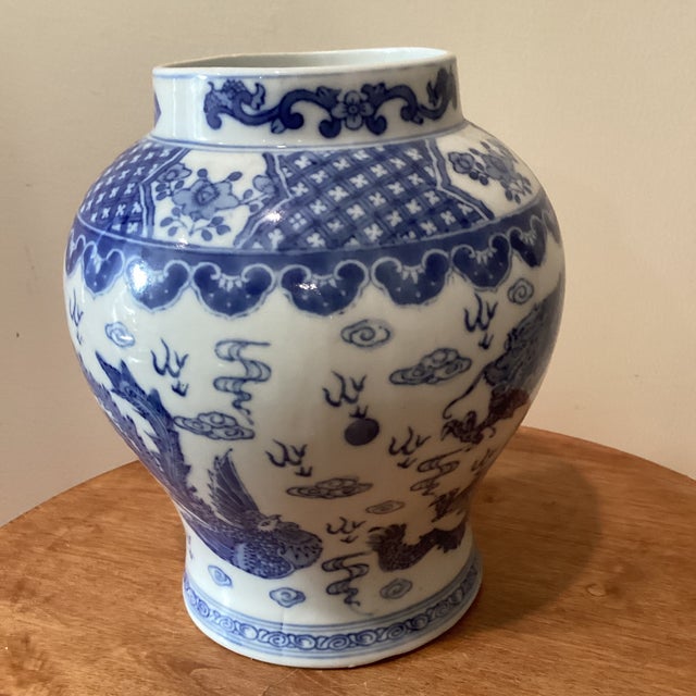 This vintage Chinese ginger jar is a stunning piece with beautiful calligraphy. The blue and white design is classic and...