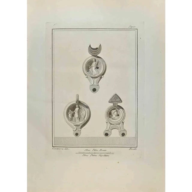 Still Life from "Antiquities of Herculaneum" is an etching on paper realized by Nicola Fiorillo in the 18th Century....