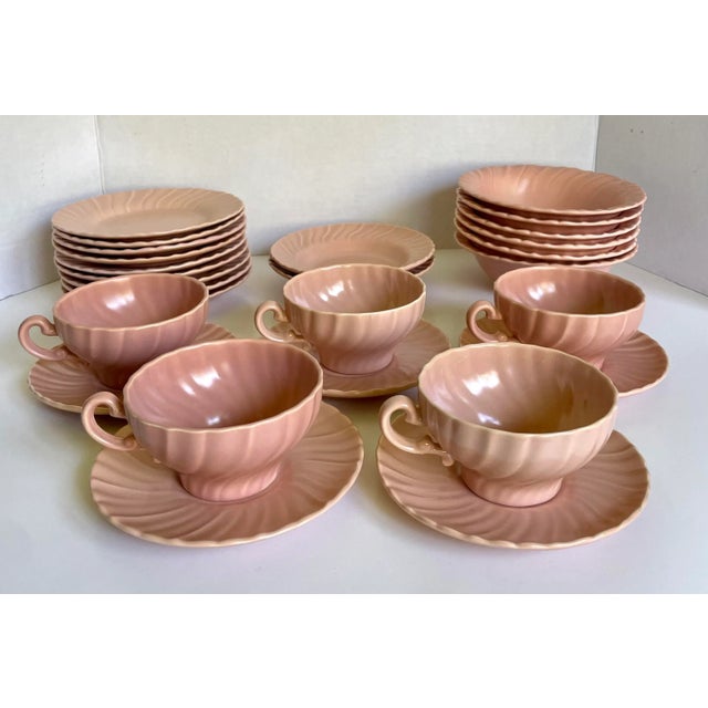 Here is a beautiful set of 44 total pieces of pink Franciscan ceramic plates! This design, Coronado, has a lovely ripply-...