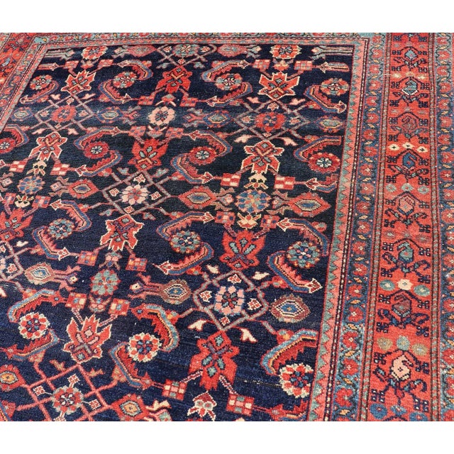 Antique Persian Malayer rug in rich blue and red colors with geometric all over design design, rug V21-0302, country of...