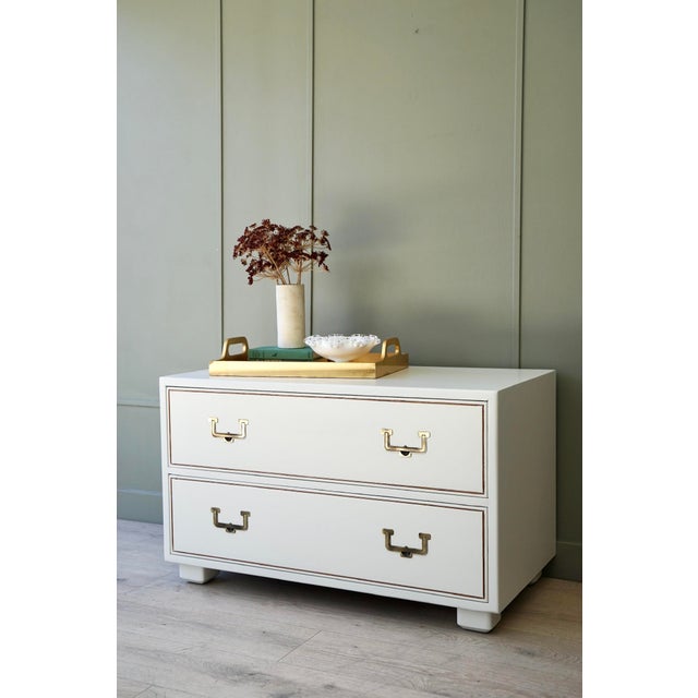 We love how this piece turned out in a silky smooth satin lacquer finish. The campaign hardware and the gold detailing...