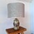 A smart british studio pottery table lamp by colin kellam, dating from the 1960s/70s. The cylindrical stoneware body has a...