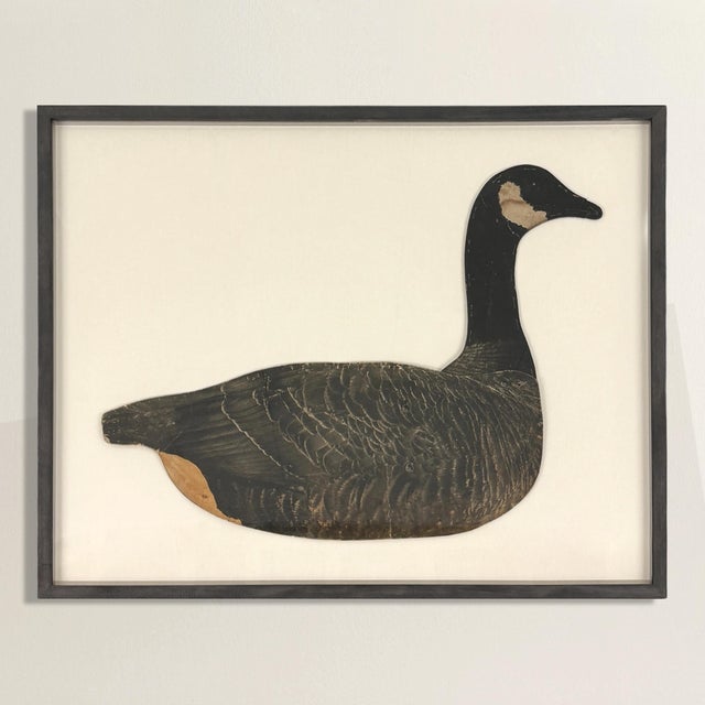 This framed American 1940s Canada Goose decoy is a striking piece of functional folk art, beautifully preserved and...