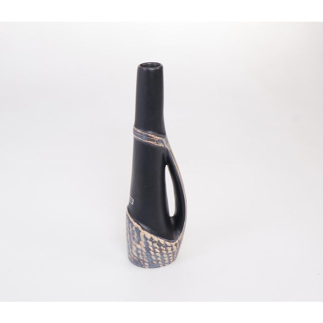 Small earthenware vase produced by bekå sweden. designed by birger åström in the 1950s/60s. beautiful small vase with a...