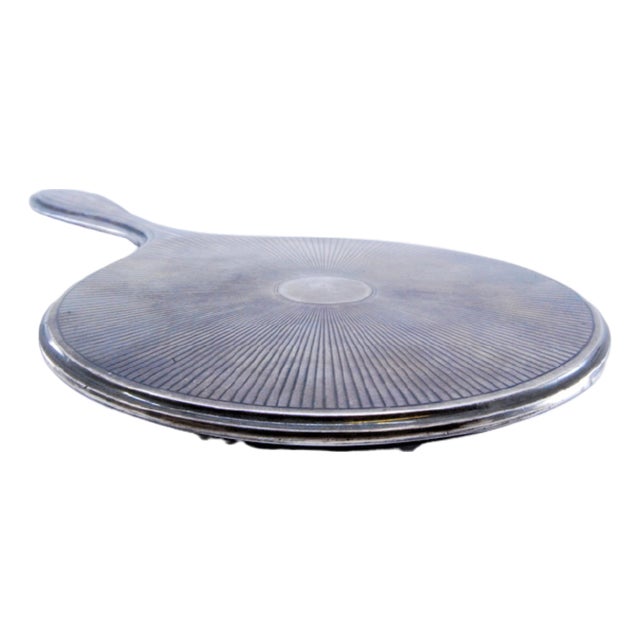 Round Hand Mirror in Plain Silver with Sunbeams Behind It For Sale