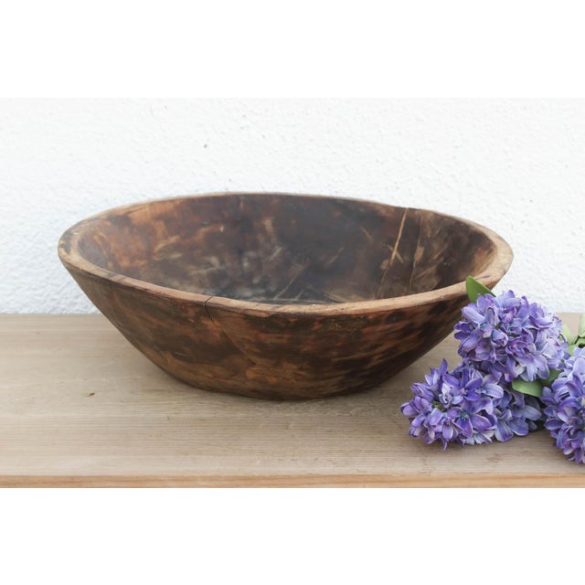 There is a soulful weight to this old wooden bowl that only comes with age. Originally hand-carved and likely used in a...