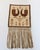 Mid-century woven wool tapestry featuring a cream background with two stylized brown birds and red floral folk motifs. No...