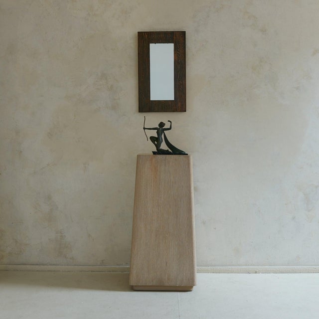 An Italian wall mirror from the Turin workshop of Victor Cerrato, dating to the 1960s. The rectangular frame is clad in...