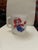 Raggedy Ann on one side, Raggedy Andy on other side of mug. Screen printed design of red and blue not scratched.