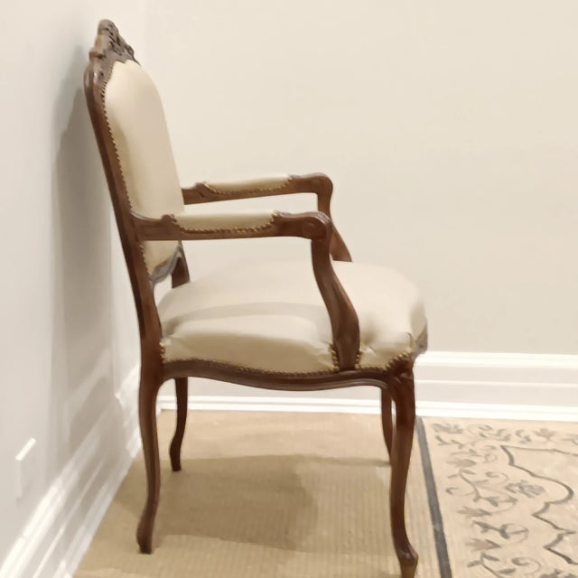 This Beautiful Vintage Hand Carved Italian Chateau D'Ax Spa Leather Arm Chair With Brass Nailhead Trim is Perfect For Any...