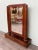 Antique Biedermeier mirror from the 19th century. Walnut structure, with a simple and refined design, in which under the...