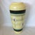 Beautiful Mid-Century Modern vase made in West Germany by Bodo Mans. Light yellow with abstract design and bands of black...