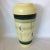 Beautiful Mid-Century Modern vase made in West Germany by Bodo Mans. Light yellow with abstract design and bands of black...