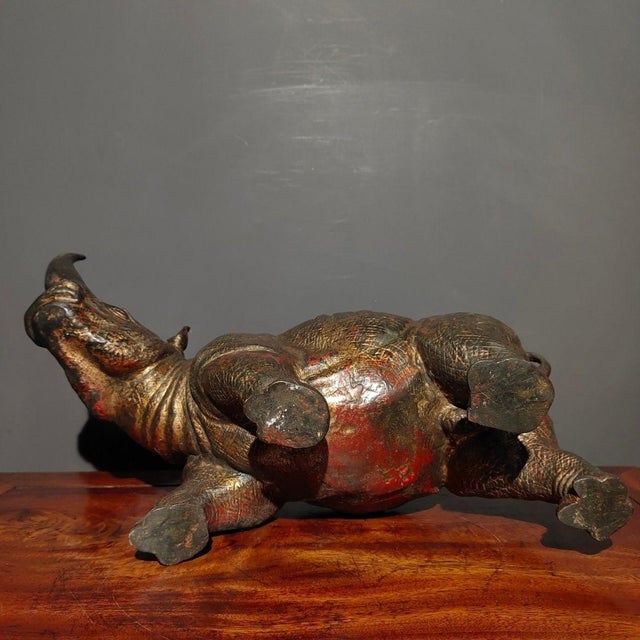 Make a bold and majestic statement in your home with this substantial vintage-style bronze rhinoceros sculpture. Crafted...