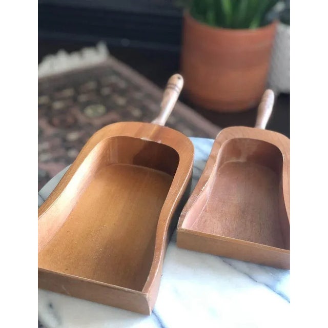 Pair of old grain scoops perfect for a storied piece of wall art or tablescape accent, or functional use to elevate the...