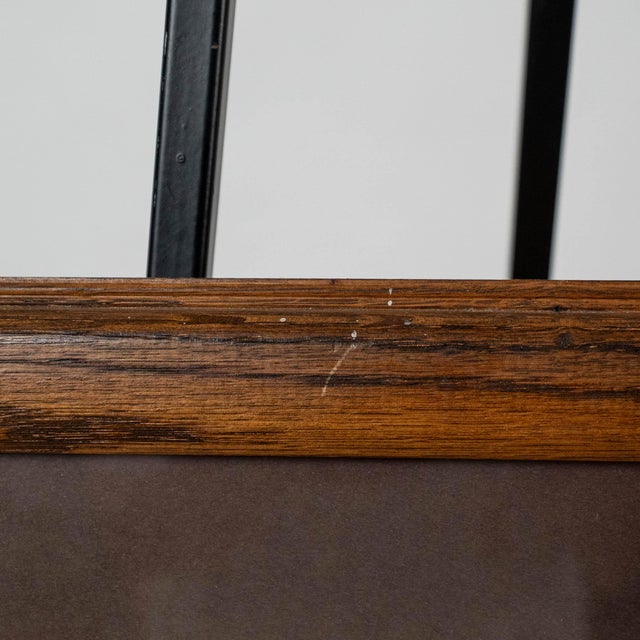 A finely detailed duck decoy print, signed and numbered by the artist. The artwork captures the rich texture and form of a...