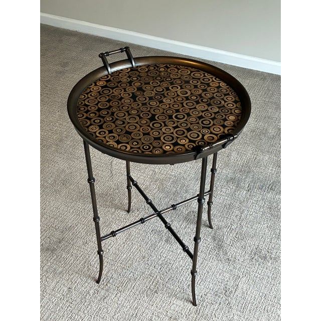 Elegant round tray-top accent table featuring a dark bronze-tone faux bamboo metal base and removable gallery tray top...