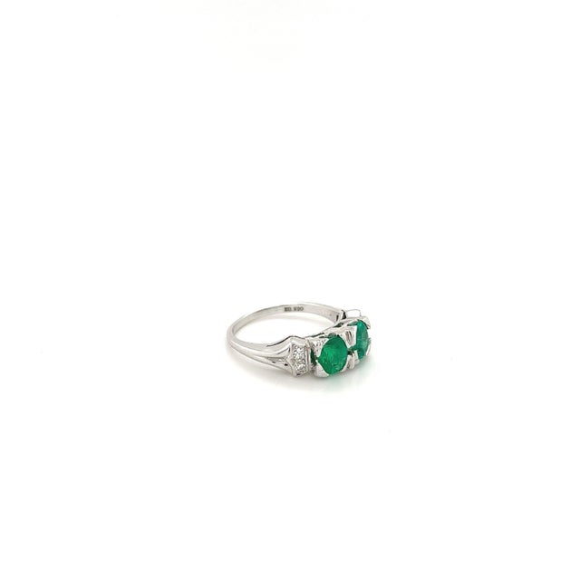 Art Deco inspired Colombian Emerald ring of 0.92 carats. The emerald carat is engraved on the inside of the ring setting....