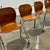 Set of four mid-century modern bentwood stacking chairs featuring beautifully sculpted plywood seats and backs with...