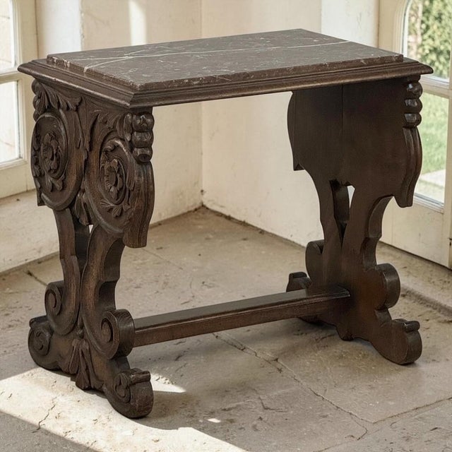 Inspired by the grand furnishings of the Italian Renaissance, this finely carved end table combines architectural strength...