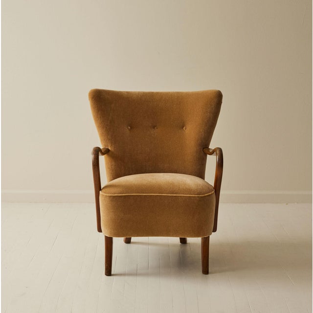 Danish Modern lounge chair attributed by Alfred Christiansen for Slagelse Møbelværk, circa 1940s. Exemplifying...