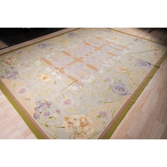 Vintage Aubusson in an Art Nouveau spirit. Lavender poppies and peach lilies on long, curving stems drift across a pale...