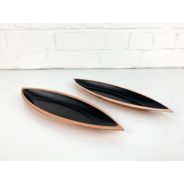 Pair of Bowls, designed by Gunnar Ander around 1955 for Ystad Metall in Sweden. Made of copper with inside enameled in...