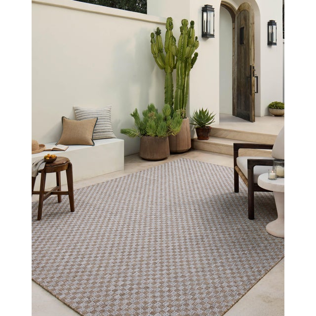 Inspired by the scenic mountain town in California, the Topanga Collection is an indoor/outdoor rug made of durable...