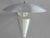 Aluminum cone with deflector wall sconce by Gotham Lighting Measures: 16” diameter x 18” deep off wall x 14” tall.