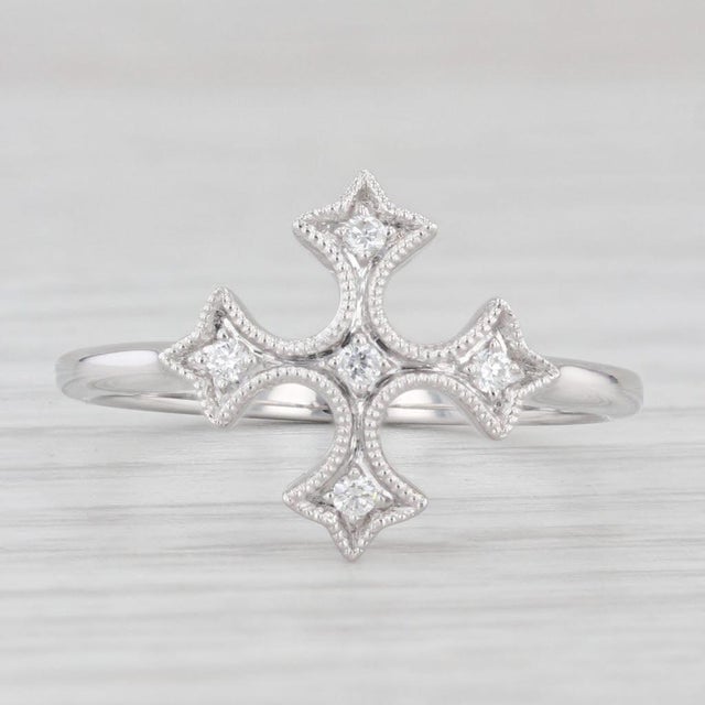 Gemstone Information: - Natural Diamonds - Total Carats - 0.06ctw Cut - Round Brilliant Color - F - G Clarity - VS2 - SI1...