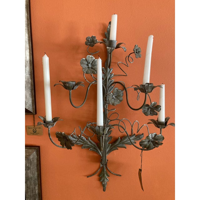 A pair of Italian or French 6 candle wall sconces. Could easily be electrified. Real showstoppers! Purchased from a Palm...