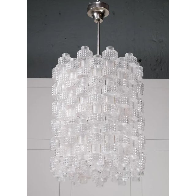 Designed by Gert Nyström and produced in Sweden by Fagerhults with glass from Orrefors. Very good condition. Height is...