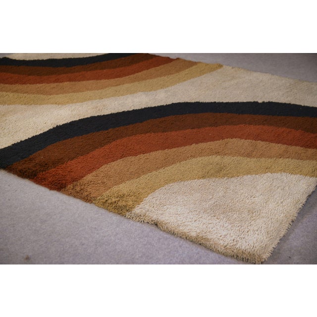 German rug produced by Herforder Teppiche, with a pop art design typical of the 1970s. A dynamic composition of flat...