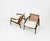 Pair of wood and fabric armchairs by Hartmut Lohmeyer, model 400. Seat height: 42 cm. Wear consistent with age and time....
