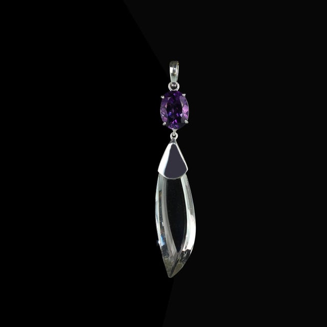 Elegant Quartz Crystal and Amethyst Pendant – A Unique Brazilian Treasure Elevate your style and spirit with this stunning...