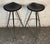 Pair of vintage modern chrome bar stools with black seats. Triangular frames and sculpted seating make these atomic space...