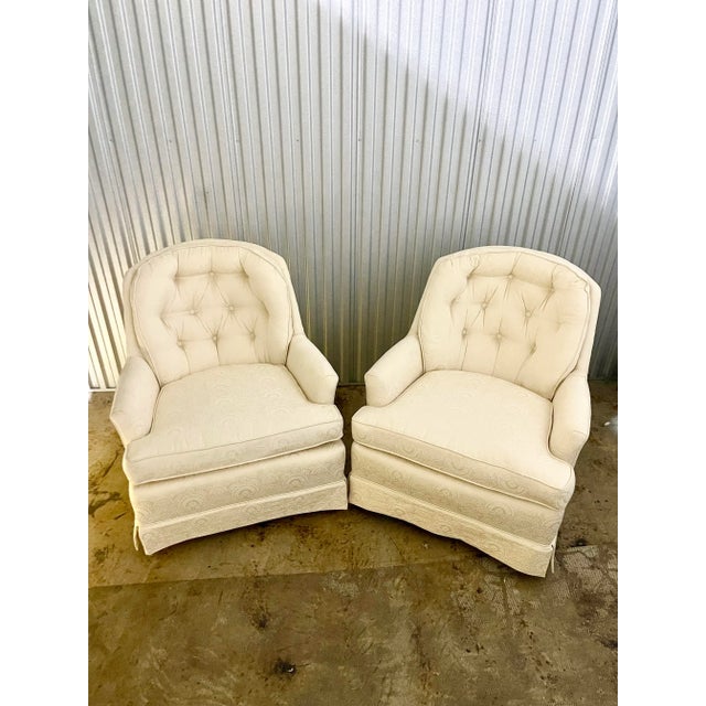 Beautiful pair of white on white damask swivel rockers. These are in near-mint condition and have been recently...