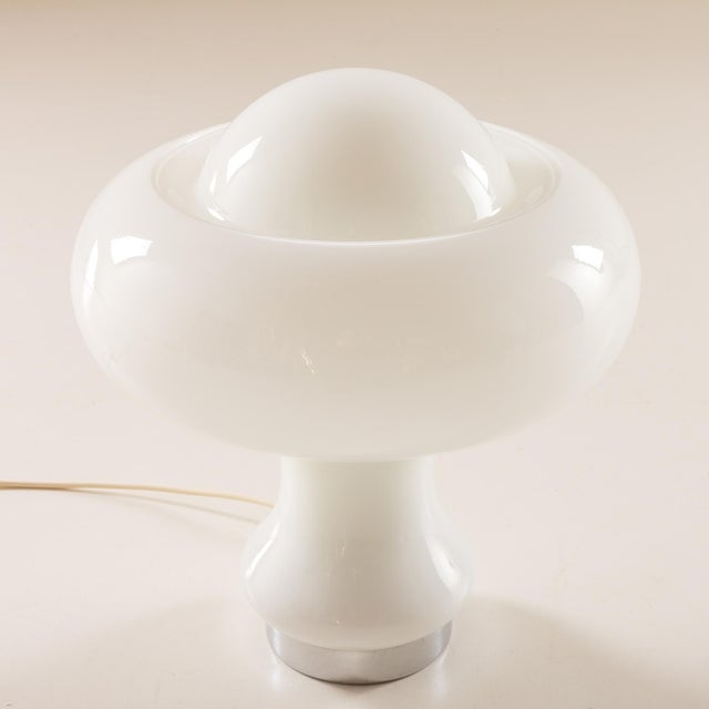 A vintage white, thick, opaline glass mushroom lamp by peill & putzler was manufactured in germany in the 1960s. It...