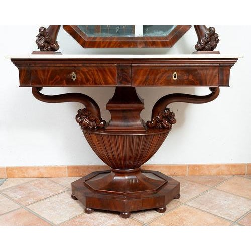 Antique dressing table in mahogany with white statuary marble, featuring two finely carved drawers, dating from the 19th...