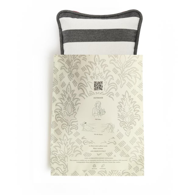 Bring a fresh Mediterranean touch to your outdoor spaces with this elegant striped cushion. Handcrafted in Italy from...