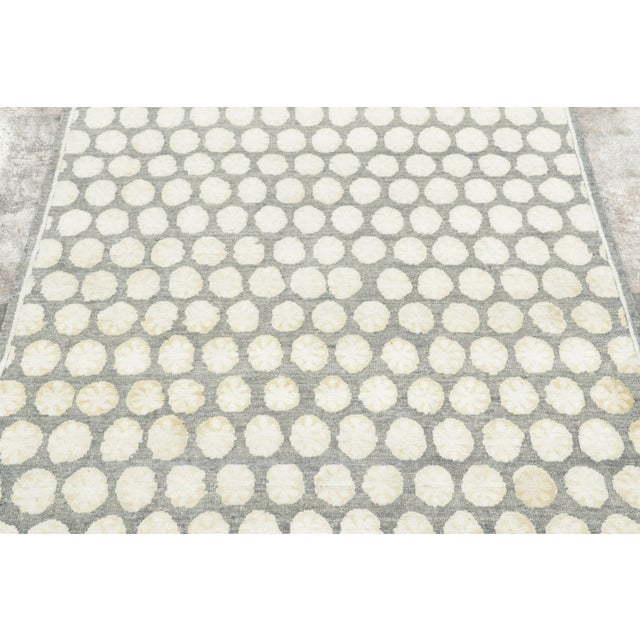 Hand-knotted in natural silk, this contemporary 4x6 rug from Rug & Kilim’s Block Print collection features repeating...