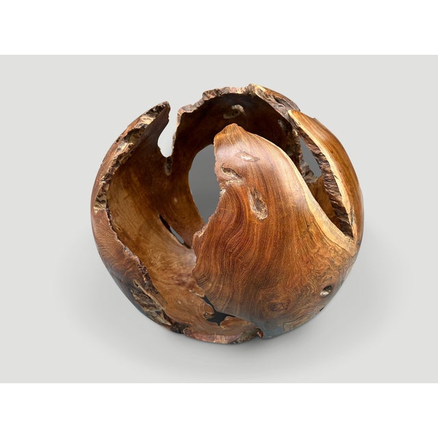 Impressive hollowed out sculptural sphere. Finished with a natural oil revealing the beautiful wood grain. This organic...