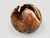 Impressive hollowed out sculptural sphere. Finished with a natural oil revealing the beautiful wood grain. This organic...