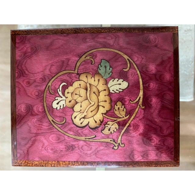 A gorgeous hand-made jewelry/music box from Reuge Switzerland, in perfect working order. A nice feature, not always...