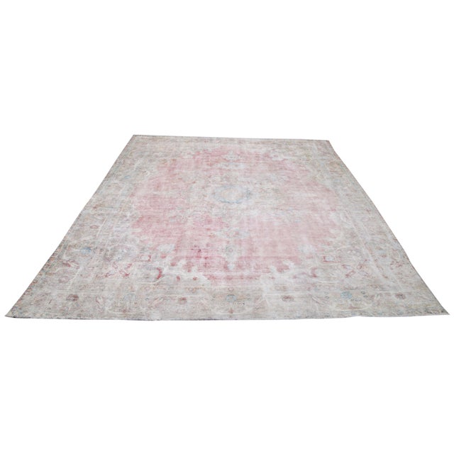 Hand-knotted with care using traditional rug-making techniques, this wool rug blends timeless craftsmanship with a modern...